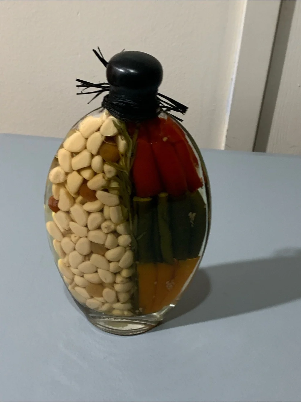 Glass Accent Bottle with Red, Green, Orange Peppers and White Beans